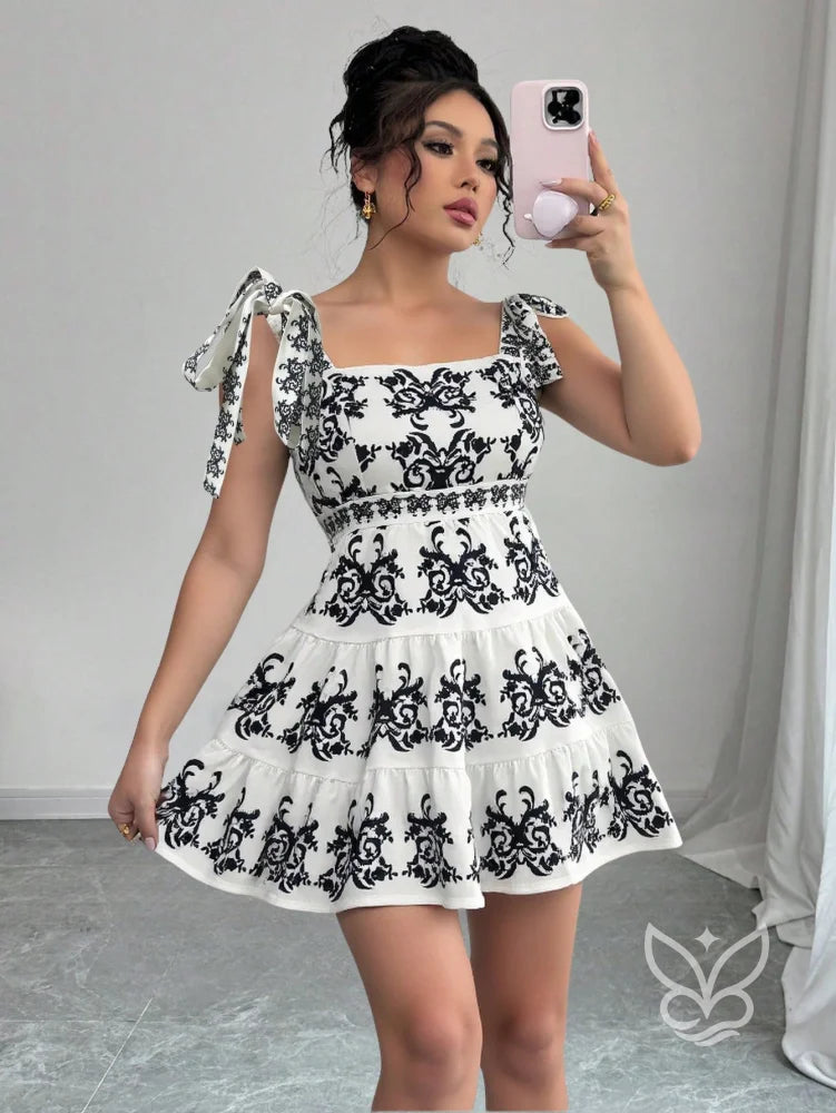Vestido Rodado Com Alça Laço E Bordado Floral Contrastante Branco / PP Vestido Rodado Com Alça Laço E Bordado Floral