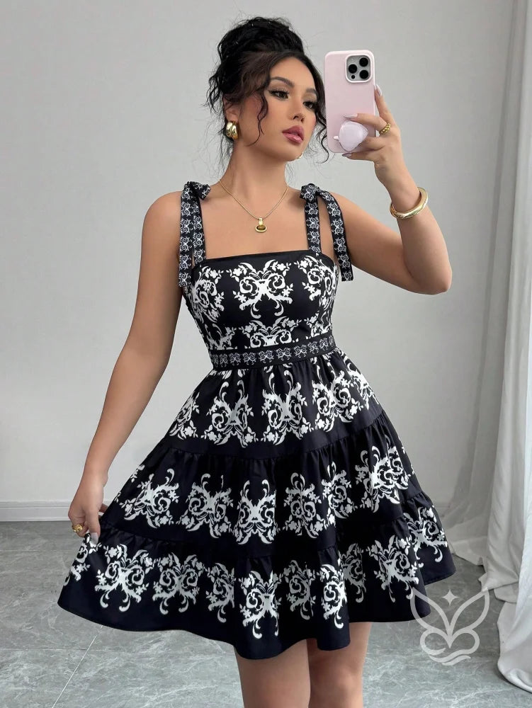 Vestido Rodado Com Alça Laço E Bordado Floral Contrastante Preto / PP Vestido Rodado Com Alça Laço E Bordado Floral